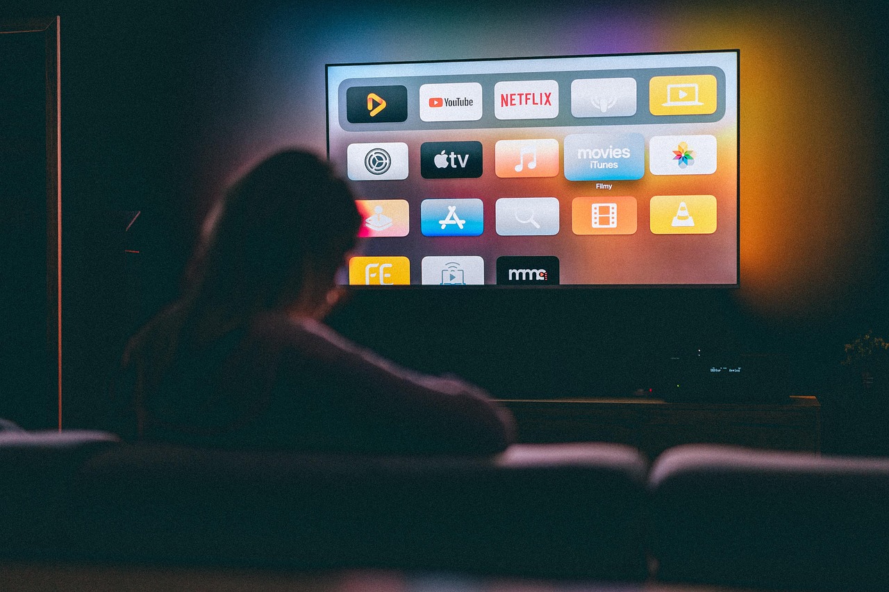 A person watching TV